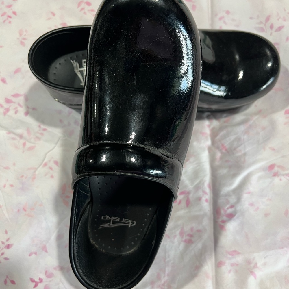 Dansko Black Patent Leather Mules with Durable Sole